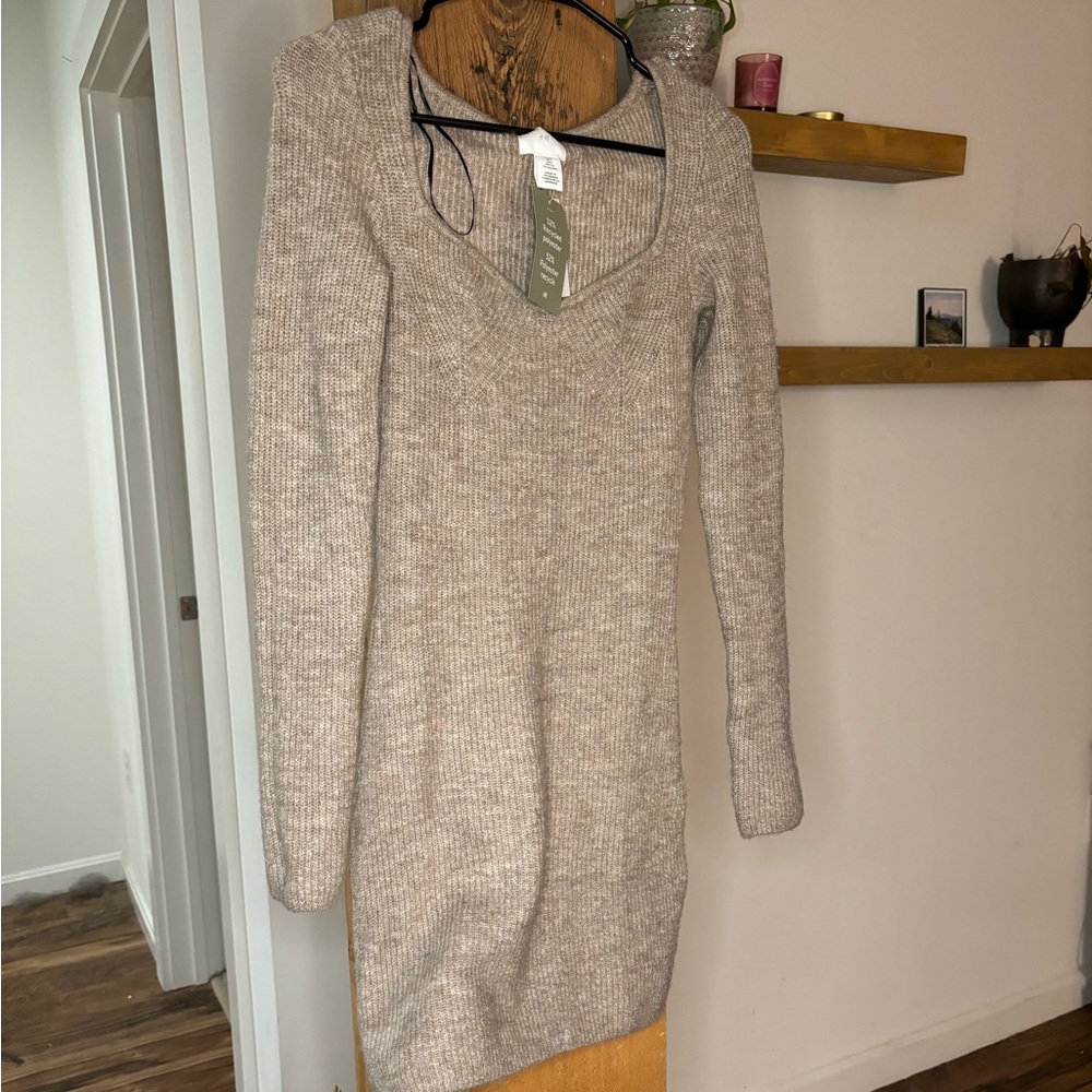 Tan women’s sweater dress from H&M, with tags.